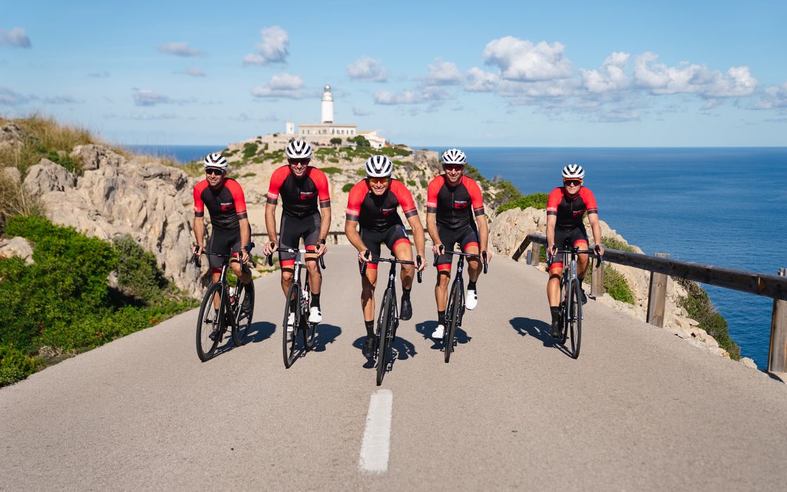 Two riders on a coast road in Mallorca