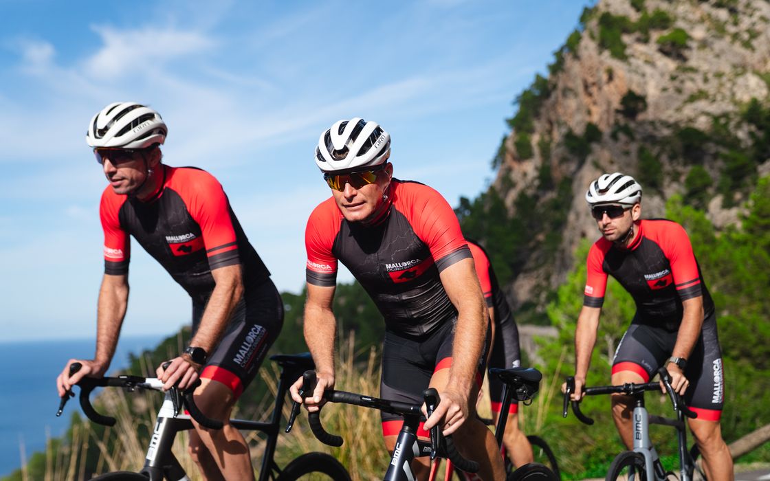Two riders on a coast road in Mallorca