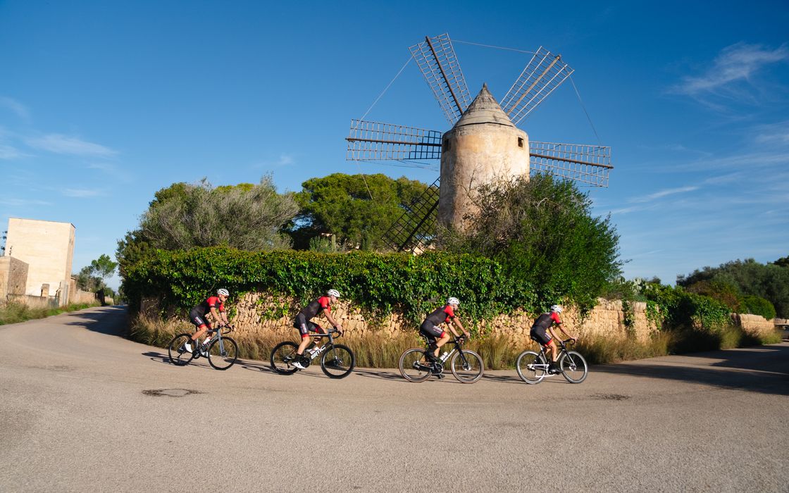 Two riders on a coast road in Mallorca